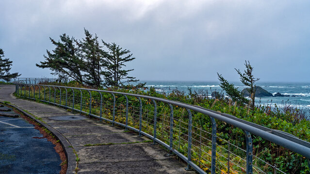 The Simpson Reef Overlook offers a view of the Pacific coast on an overcast day near Charleston, Oregon, USA