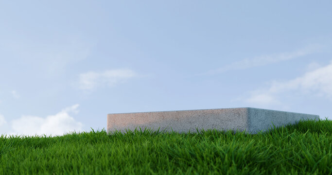 Minimal Stone Platform on Green Grass Field