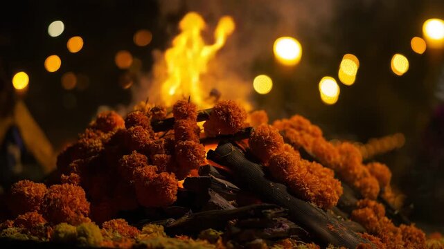 Hindu cremation, cremation ceremony, marigold flowers, funeral ritual, last rites, sacred fire, Hindu funeral, mourning, spiritual ceremony, death ritual, memorial tradition, cremation ground