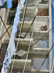 Dhobi Ghat open-air laundry district with high-rise skyline in Mumbai, Maharashtra, India.
