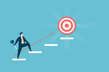 Businessman holding a dart and climbing white steps toward a red target bullseye with an upward arrow, representing career growth, achievement, and goal setting.