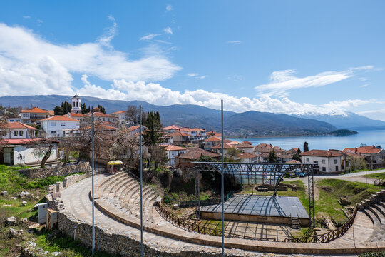 Ancient amphitheater or antique theatre of Ohrid with view of old town by Lake Ohrid in Macedonia
