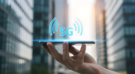 A hand holding a smartphone with a 5g network signal icon in front of a cityscape