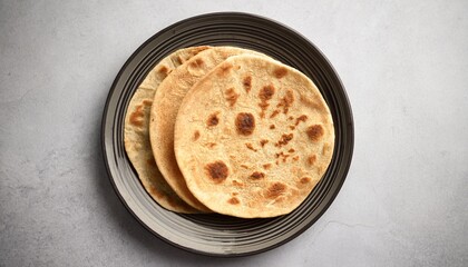 Top Down Shot Of Chegir Tughur Uyghur Thin Flatbread Neatly Arranged On A Minimalist Plate
