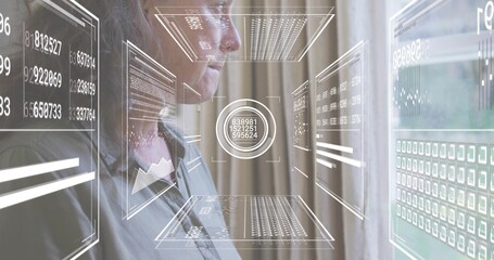 Studying woman in button-up shirt focusing on virtual panels and central HUD in room by curtains