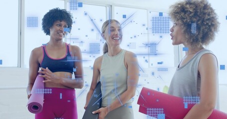 Talking three women holding rolled mats in studio with windows ballet barre activewear HUD overlays