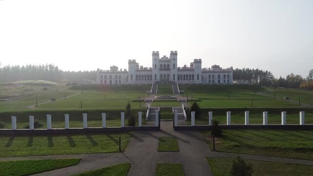 Aerial view of Kossovo Castle in Belarus on a sunny day. Belarusian landmarks