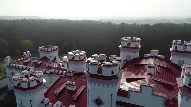 Aerial view of Kossovo Castle in Belarus on a sunny day. Belarusian landmarks
