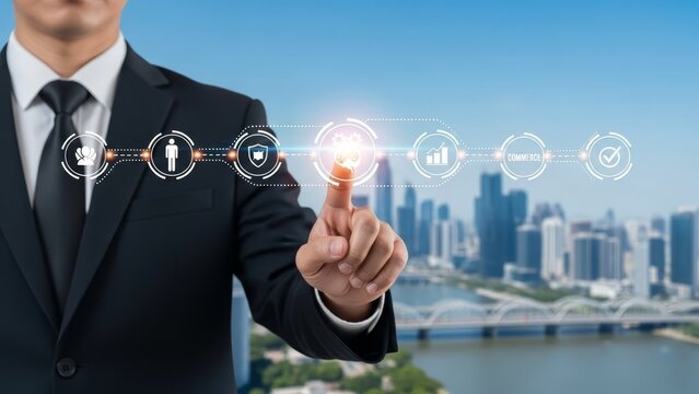 Businessman points to glowing digital icons, symbolizing business strategy and technological innovation. - Powered by Adobe