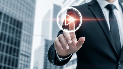 Businessman's finger touches a glowing play button icon against a city skyscraper background.