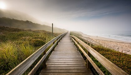 Fototapeta premium misty coastal wooden walkway