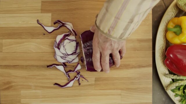 slow motion red cabbage cutting 