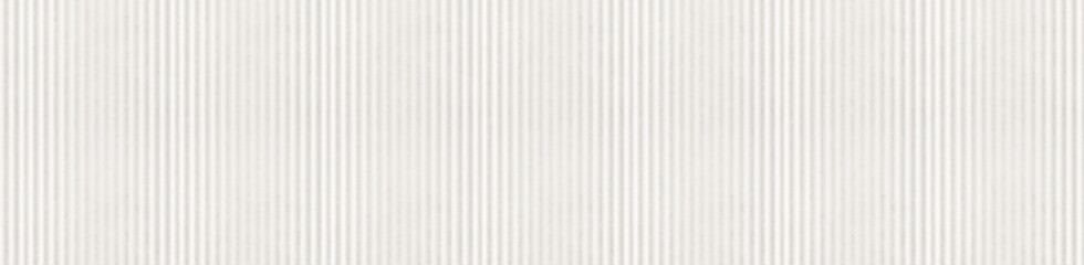 Obraz premium Panoramic beige and white marble texture with vertical ribbed stripes and stone relief
