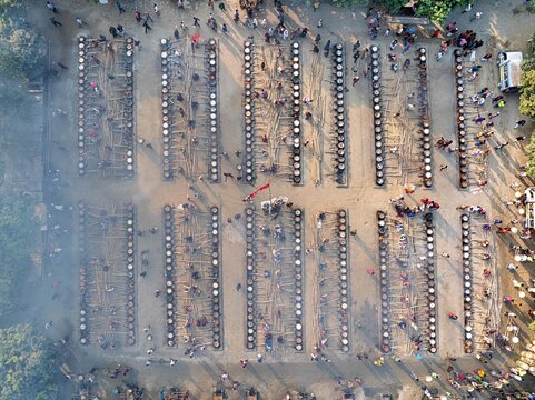 Faridpur, Bangladesh, January 12, 2026 -- Volunteers prepare meals on thousands of stoves during the annual Urs at the World Zaker Manzil shrine in Faridpur.