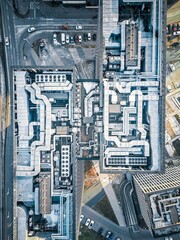 Drone shot city building rooftop ventilation details