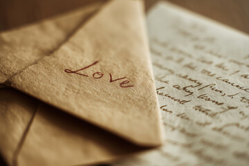 Love letter partially inside envelope with handwritten note visible