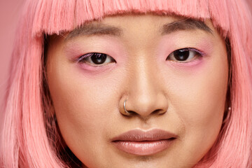 Vibrant pink hues accentuate youthful beauty in a charming portrait filled with bliss