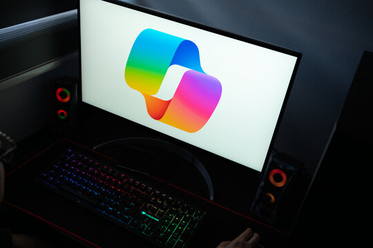 Punta Arenas, Chile &ndash; January 20, 2026: High-angle view of a workstation featuring the colorful Microsoft Copilot icon on screen