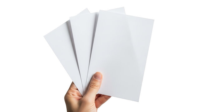 Hand holding blank white paper sheets for mockup or presentation isolated on transparent background