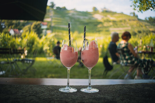 Fozen rose wine and vineyards