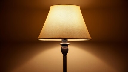 Elegant table lamp casting warm light with textured shade in cozy indoor setting creating a tranquil atmosphere for relaxation or reading