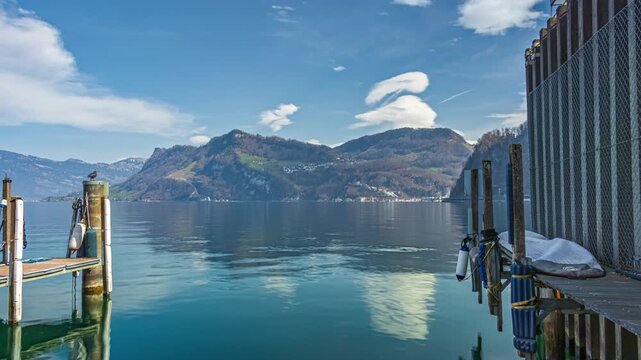 Time lapse, lake in the mountains, view from Hergiswil towards Buergenstock. Lake Lucerne, Vierwaldstaettersee, Switzerland.