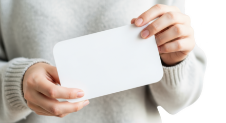 Woman in sweater holding blank white card for invitation or message isolated on transparent background