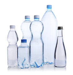 Naklejka premium Water bottles of different sizes isolated on white