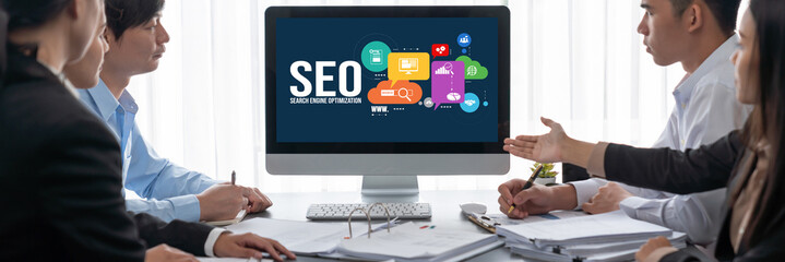 Business intelligence and data analysis concept. Analyst team working on financial data analysis dashboard on laptop screen as marketing indication for effective business strategic planning. Insight