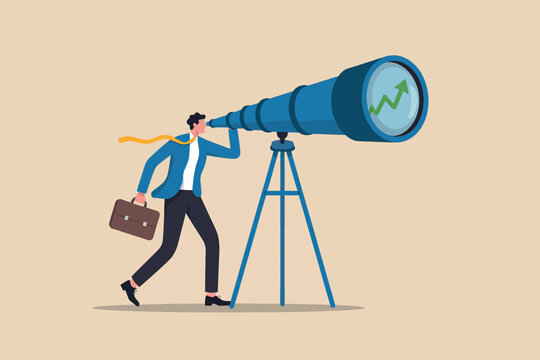 Businessman looking through a telescope, envisioning future growth and market success