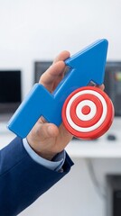 Successful goal targeting with arrow in bullseye business metaphor vertical concept