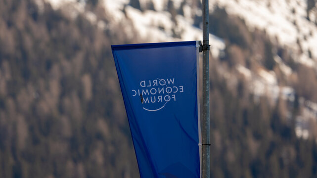 Davos, switzerland, january 20th 2026 world economic forum banner flying in davos switzerland