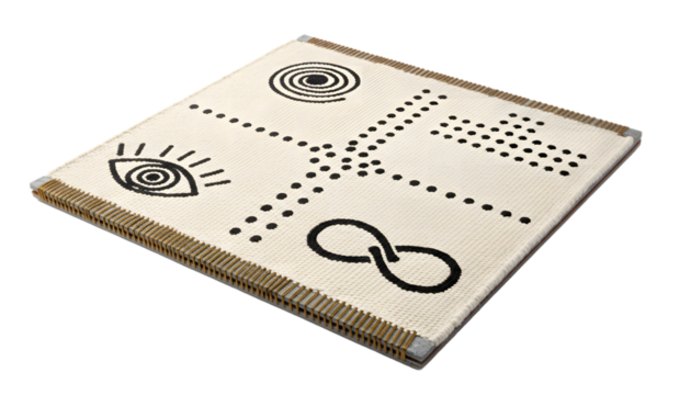 A close-up view of a white book with unique black symbols on the cover - Powered by Adobe