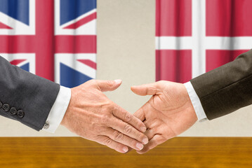 Symbolic cooperation concept &ndash; Great Britain and Denmark handshake