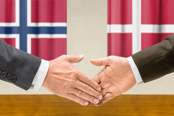 Symbolic cooperation concept &ndash; Norway and Denmark handshake