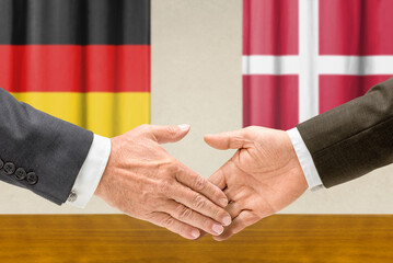 Symbolic cooperation concept &ndash; Germany and Denmark handshake