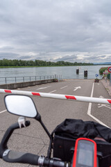 Bicycle handlebars at Rhine river ferry terminal barrier