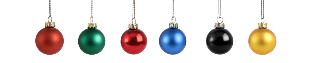 differently colored christmas ornaments hanging on strings