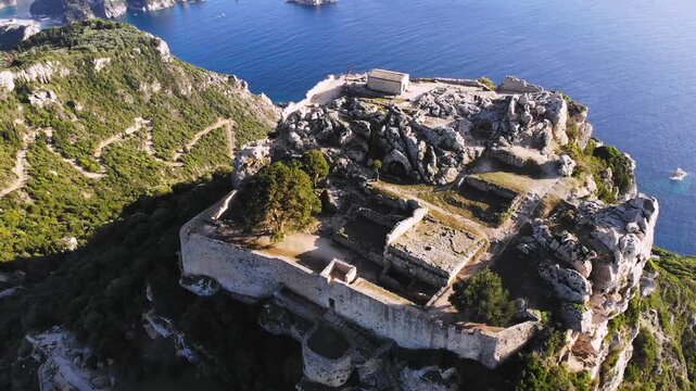 Angelokastro Castle near Palaiokastritsa and Krini, Corfu Island, Ionian sea, Central Corfu and Diapontia Islands, Greece, summer sunny view of Angelokastro fortress, Kerkyra travel, Greek landscape