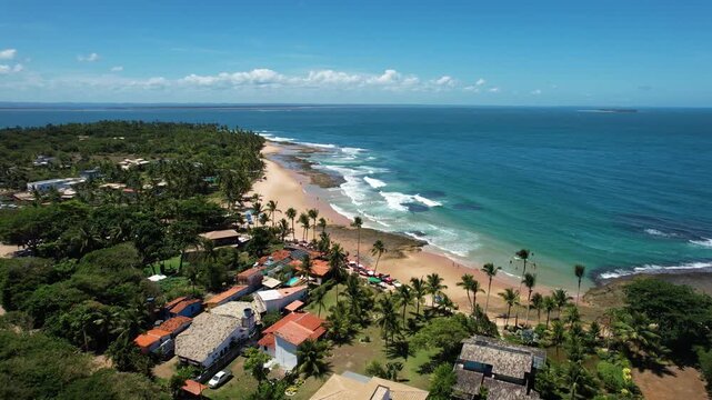 Panoramic aerial image of Tr&ecirc;s Coqueiros beach, southern coast of Bahia, Mara&uacute; Peninsula, Barra Grande, beach with coconut trees, large stretch of white sand, blue water, paradisiac
