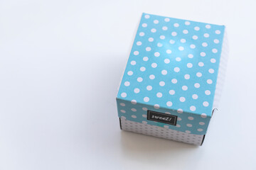 Cardboard dessert box with the word sweet, minimal packaging design for bakery and confectionery products