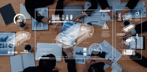 A business team engaging in a collaborative meeting, featuring digital overlays that represent data analysis, innovative technology, and strategic planning. Trope