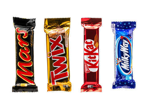 Yerevan Armenia 1.10.2026. Four different candy bars are shown, including Mars, Twix, KitKat, and Milky Way