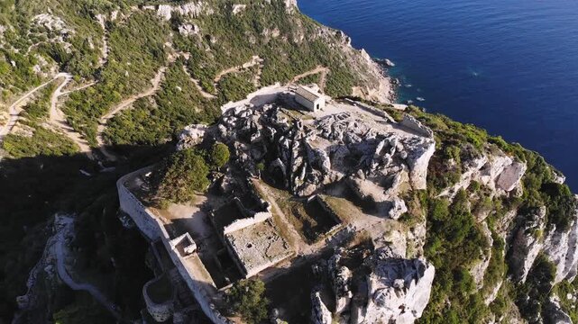 Angelokastro Castle near Palaiokastritsa and Krini, Corfu Island, Ionian sea, Central Corfu and Diapontia Islands, Greece, summer sunny view of Angelokastro fortress, Kerkyra travel, Greek landscape