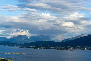 Obraz premium Dramatic Panoramic View of Sunnmøre Alps from Mount Aksla Ålesund Norway featuring Rainbow
