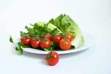 Boost your vitality with fresh vegetables. High-quality scene of organic tomatoes and lettuce for healthy lifestyle, dieting, and vegan recipes.