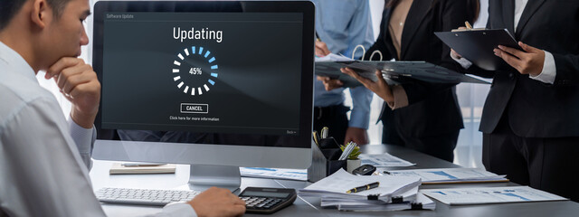 Business intelligence and data analysis concept. Analyst team working on financial data analysis dashboard on laptop screen as marketing indication for effective business strategic planning. Insight