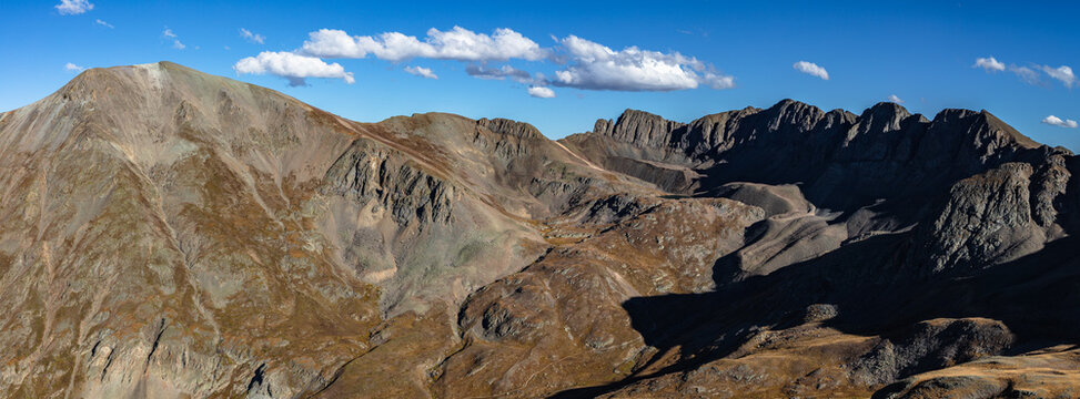 This scenic San Juan Mountain panorama features Colorado 14er Handies Peak and 13er American Peak rising above American Basin and Sloan Lake.