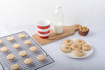 Homemade cookies and a bottle of milk.