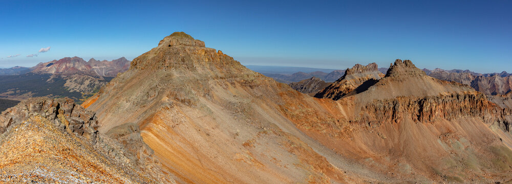 This colorful mountain panorama features Colorado 13ers Vermilion Peak, Golden Horn, and Pilot Knob, located in the beautiful San Juan Mountains near Silverton.